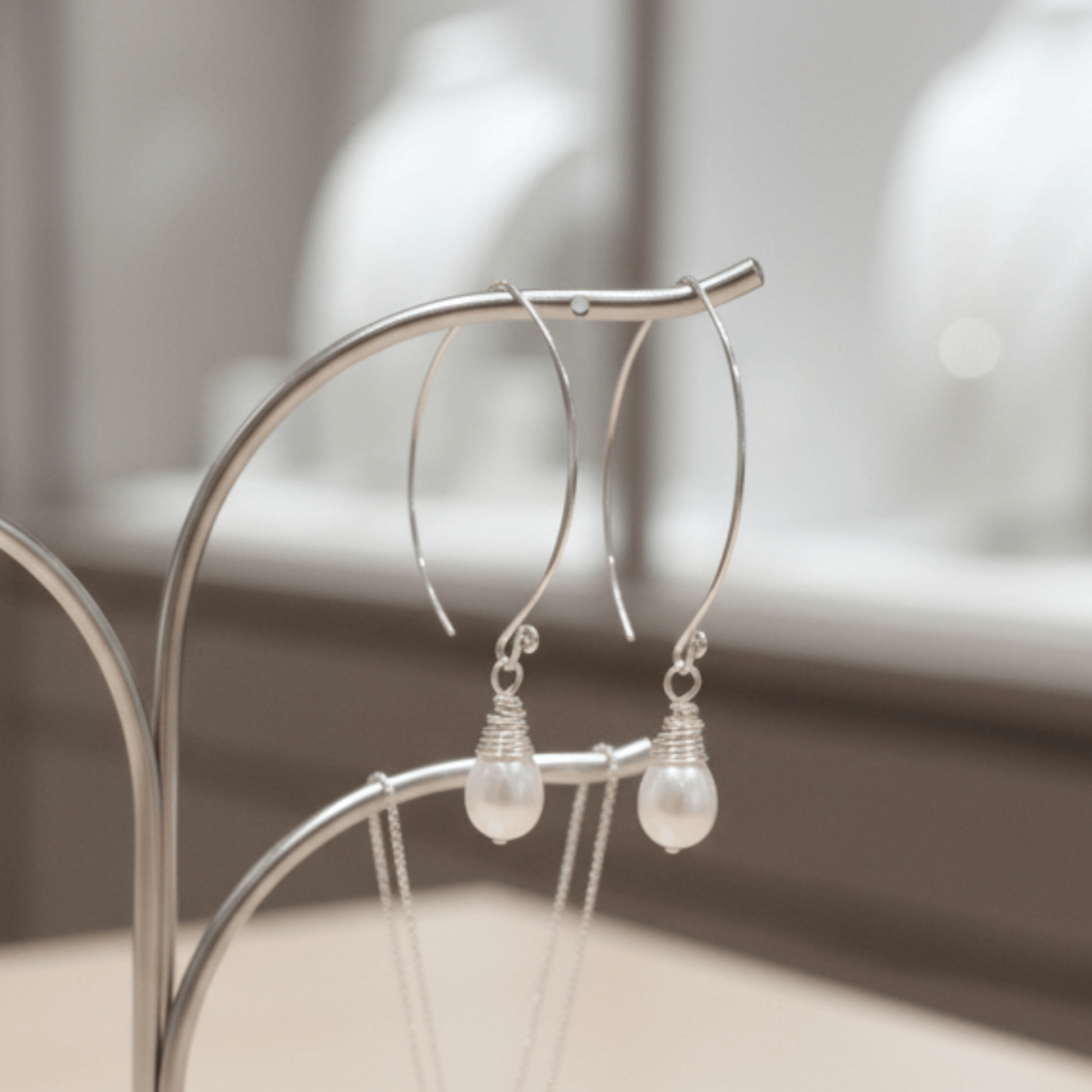 terling silver S925 real fresh water pearl pendant necklace photographed on embroidered lace background