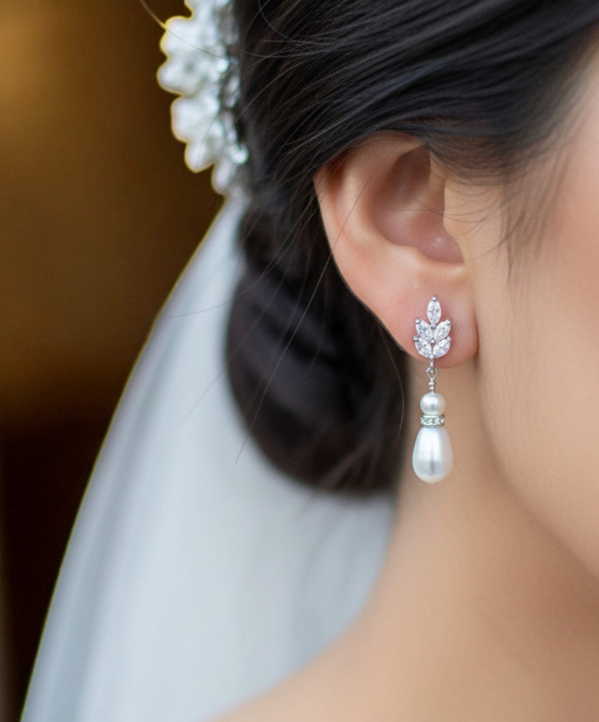 silver freshwater pearl double-drop earrings photographed on minimal white background