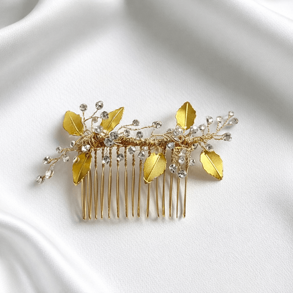 Gold crystal bridal comb placed in a romantic bridal hairstyle