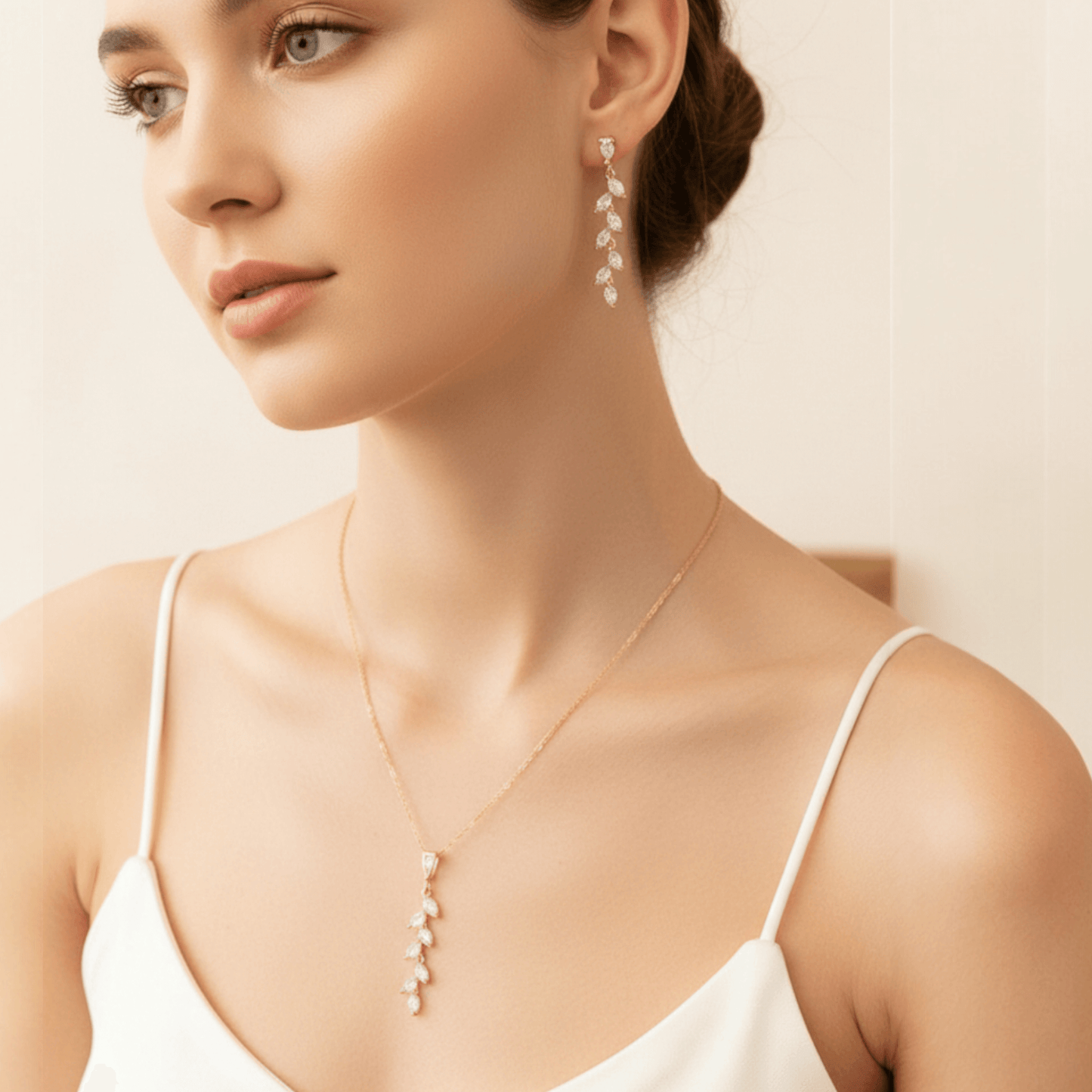 14k gold‑plated leaf necklace photographed on model