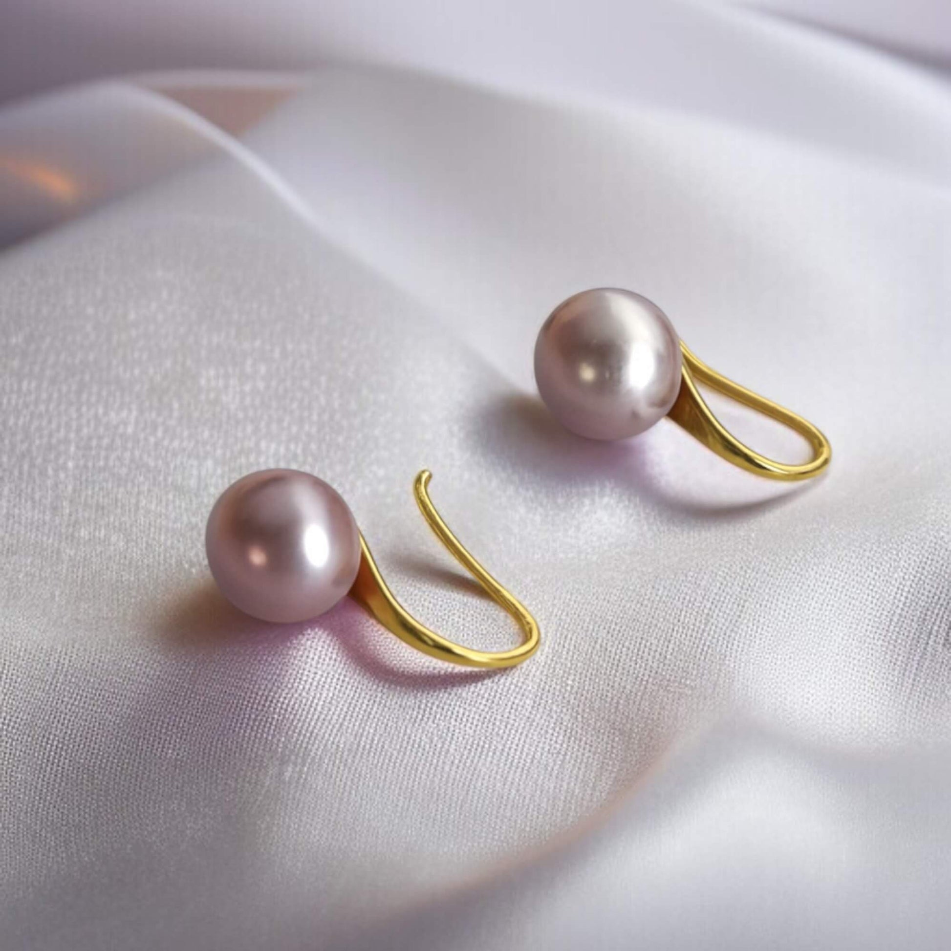 S925 silver pearl hook photographed on clean white backdrop