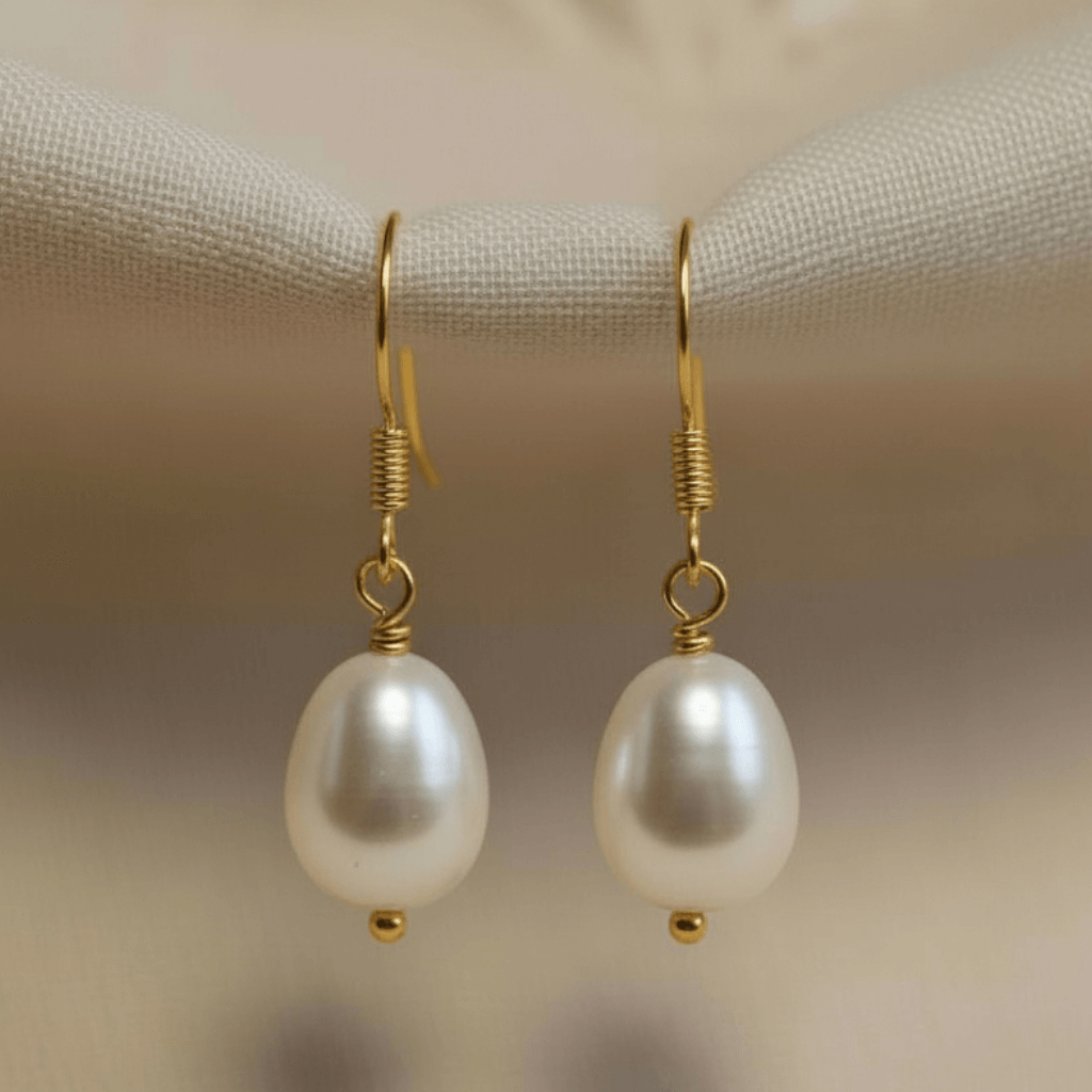 S925 silver pearl earring photographed on natural light backdrop
