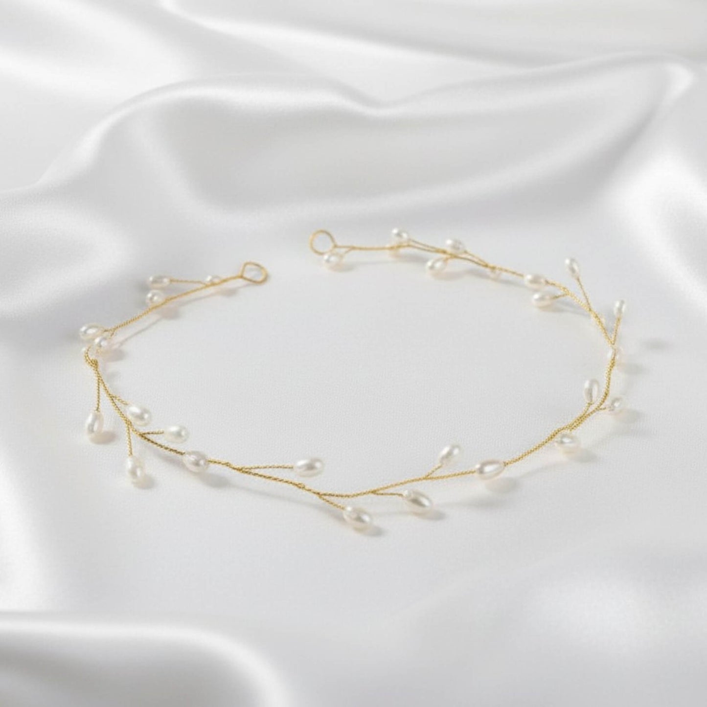 Gold pearl vine headpiece on natural bridal hairstyle