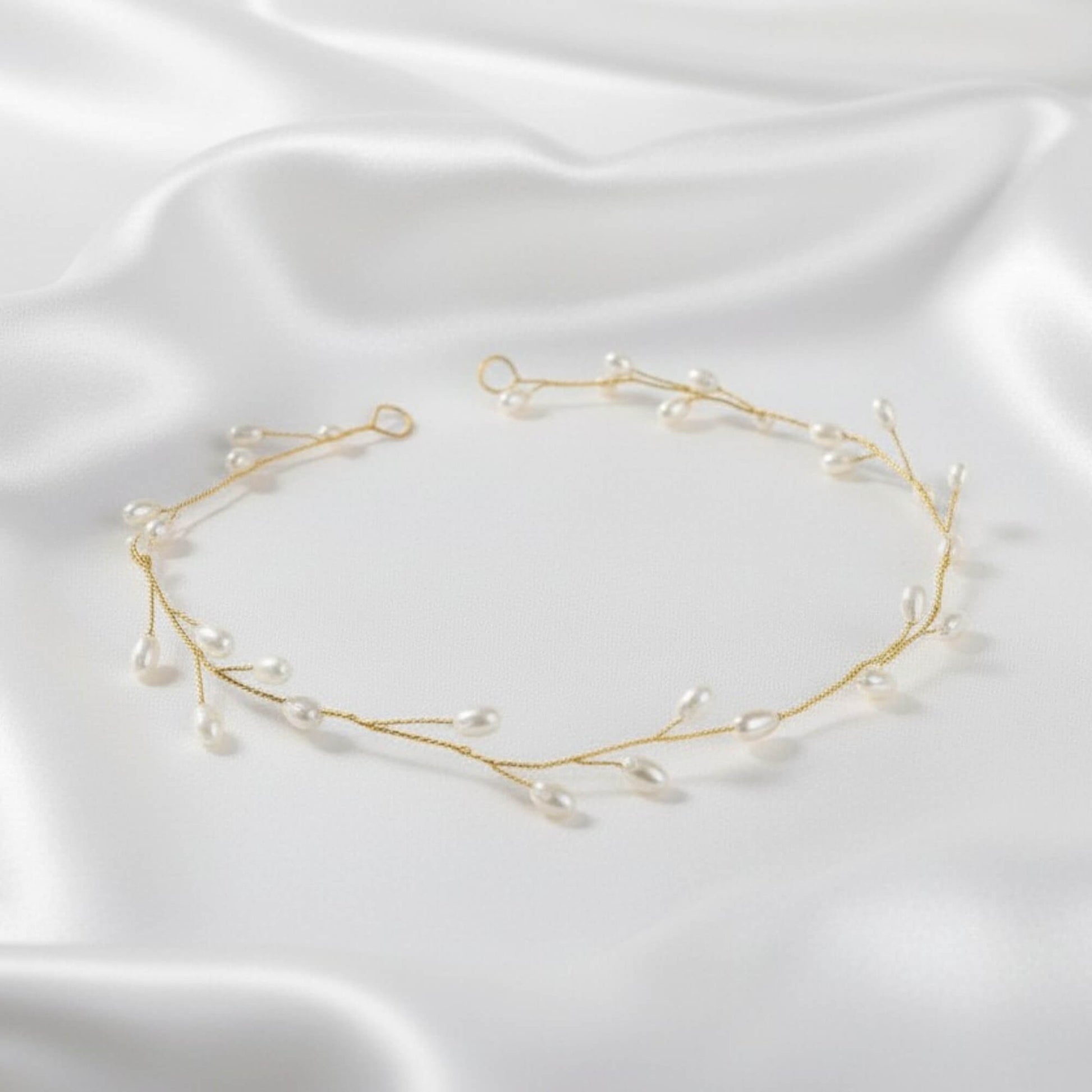Gold pearl vine headpiece on natural bridal hairstyle