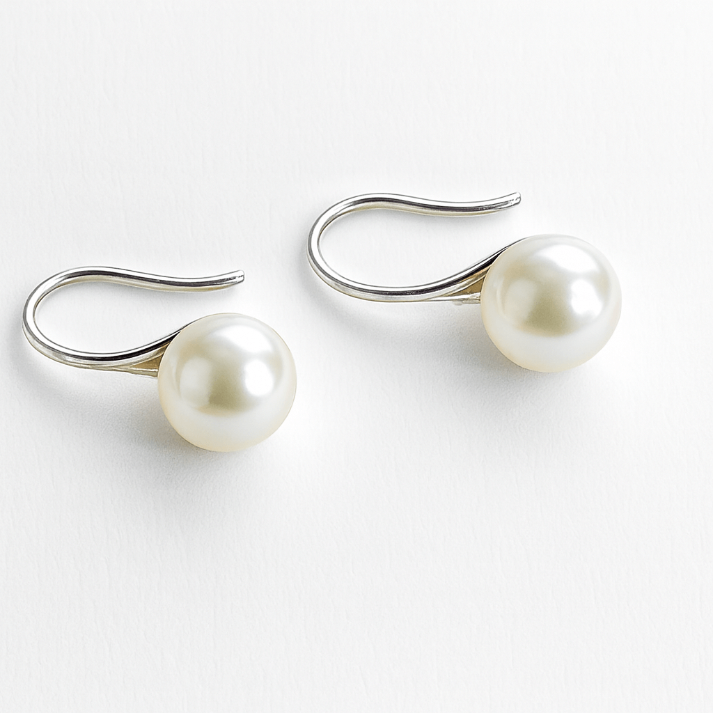 S925 silver curved drop photographed on soft neutral background