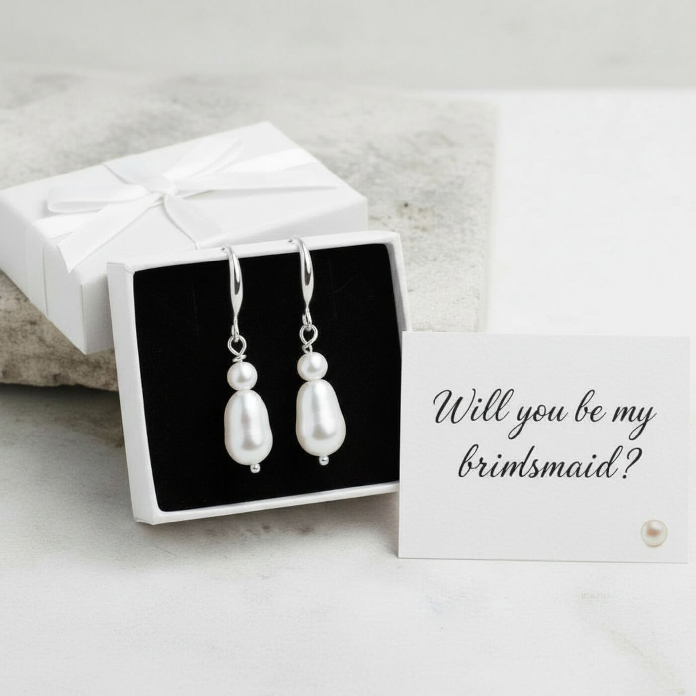 S925 silver bridal drop earrings photographed on gift box