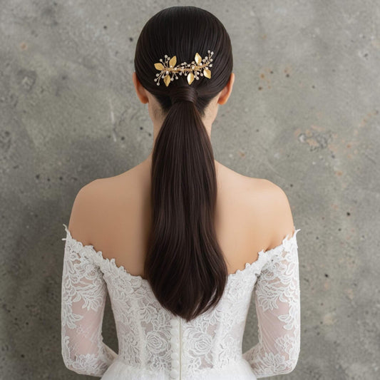 Gold botanical crystal bridal hairpiece on soft white background, 10cm