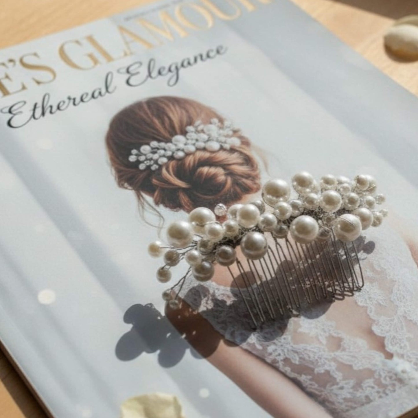 Pearl hair comb on a magazine with a woman's hairstyle on the cover
