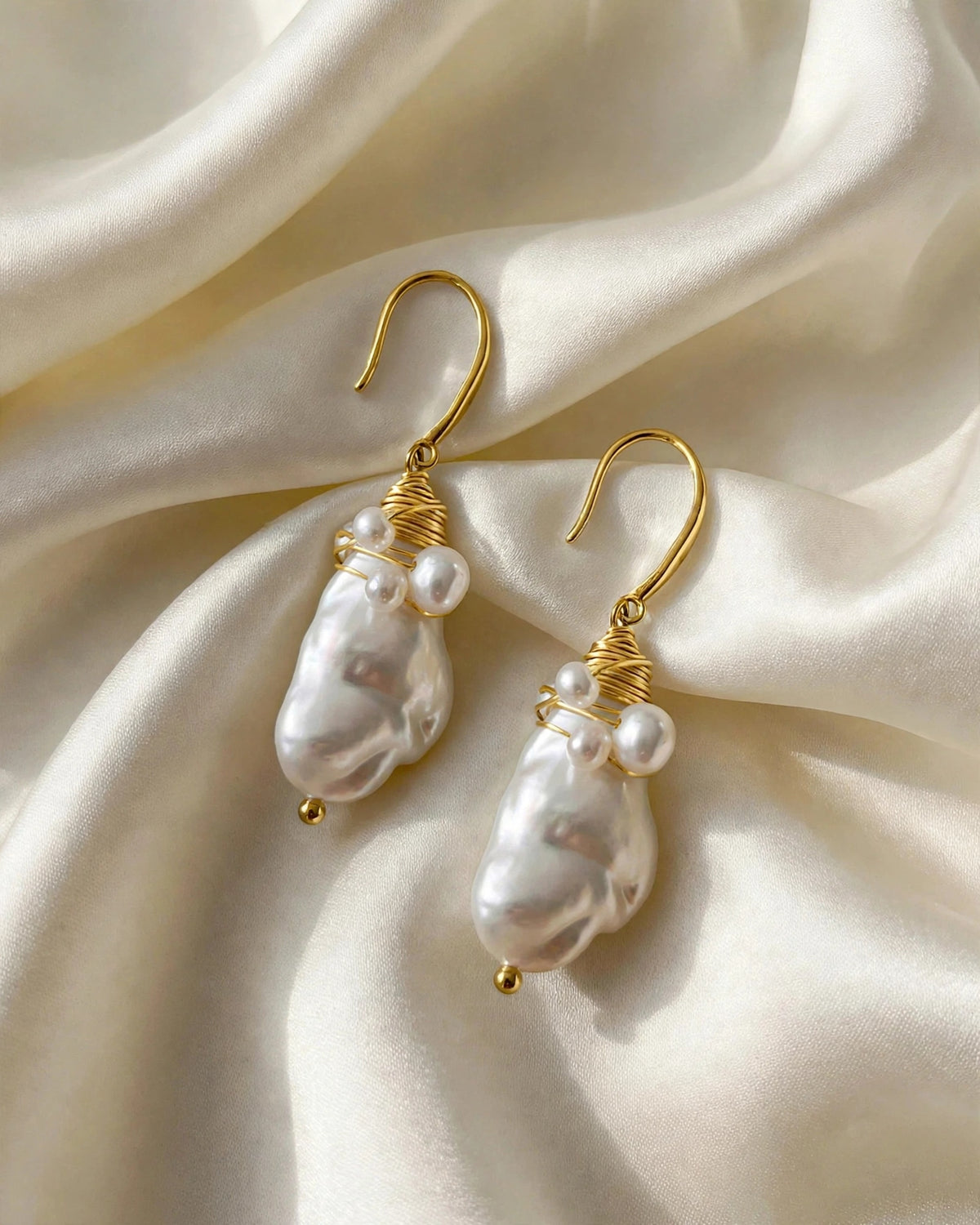 baroque pearl dangle earrings displayed on neutral background for bridal styling and wedding accessories