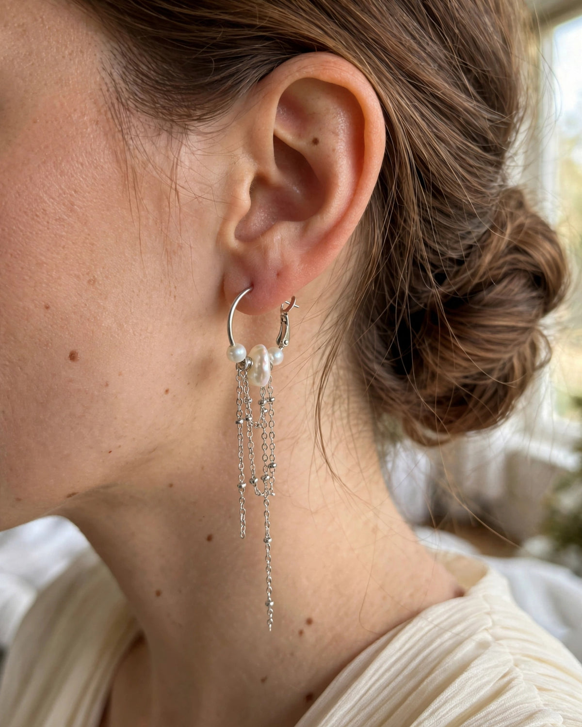 Bridal look featuring delicate pearl dangle earrings