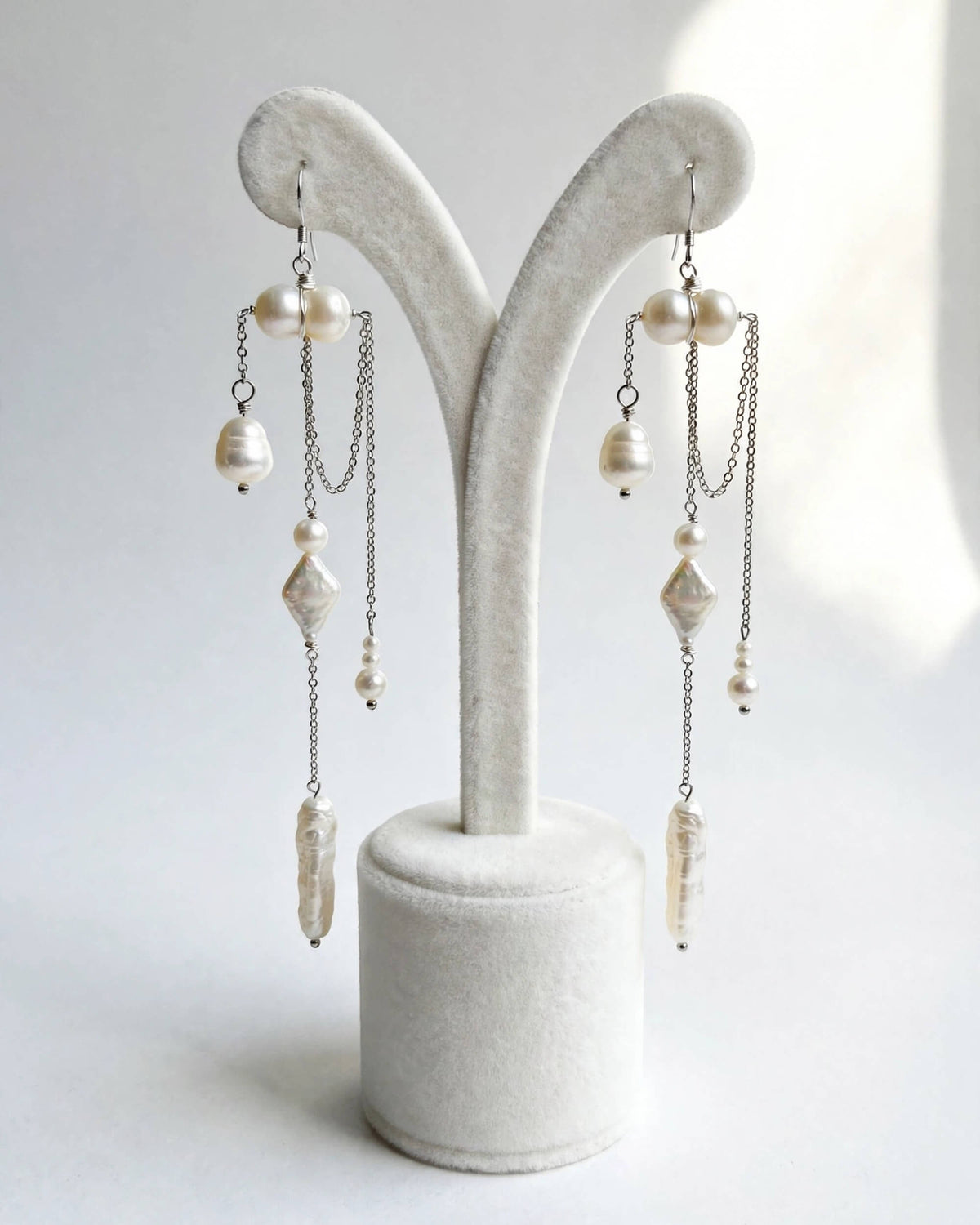 Front view of freshwater pearl dangle earrings