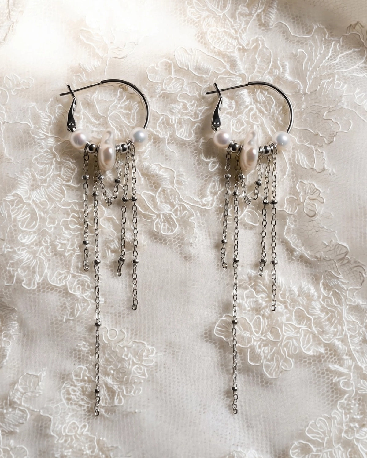 Freshwater pearl dangle earrings with an elegant drop design