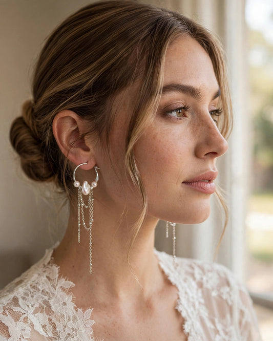 Bride wearing freshwater pearl dangle earrings for a wedding