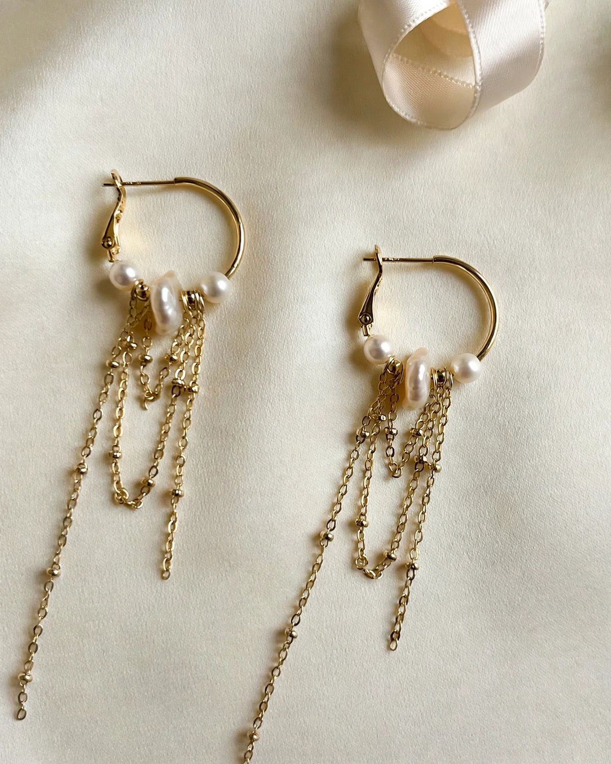 Detailed view of elegant freshwater pearl earrings