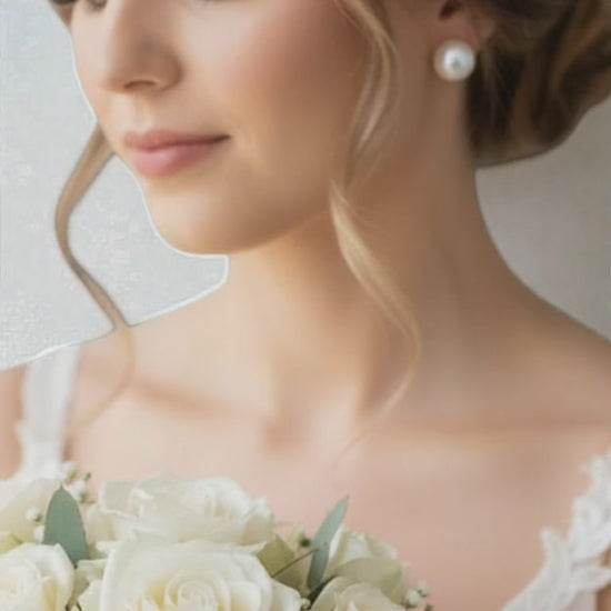 close-up-video-of-large-pearl-drop-earrings-worn